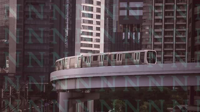 Elevated Monorail Transit in Tokyo Urban Landscape.